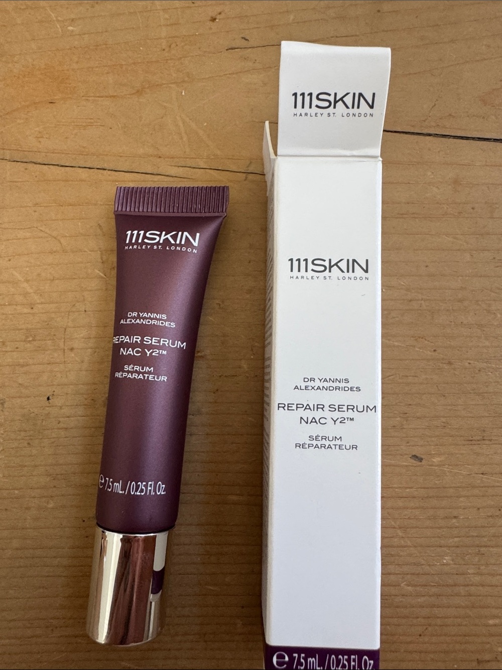 111SKIN Repair Serum in Plum with Silver Cap